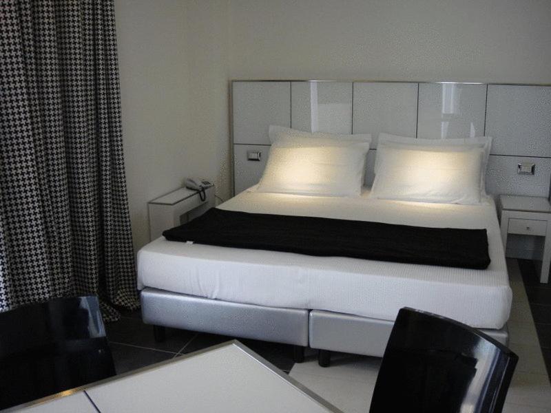 Atmosphere Suite Hotel Римини Номер фото